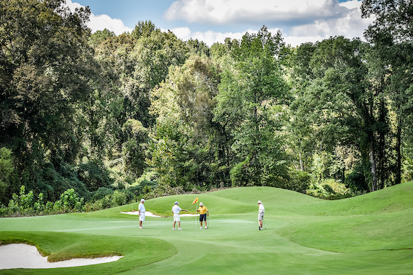 Golfers playing on the Robert Trent Jones Golf Course