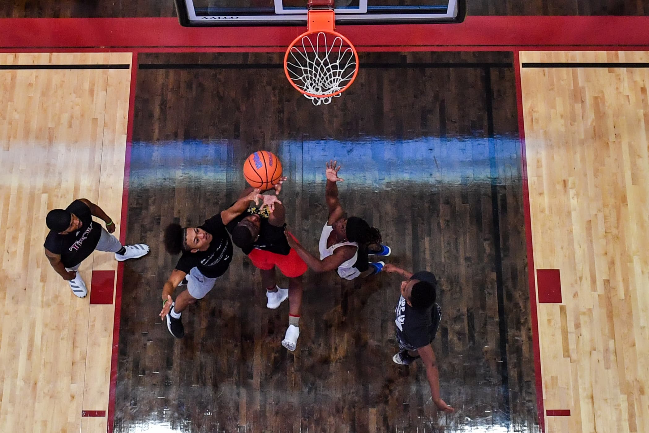 Students playing basketball for intramural sports