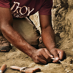 TROY student at an archaeology dig. 