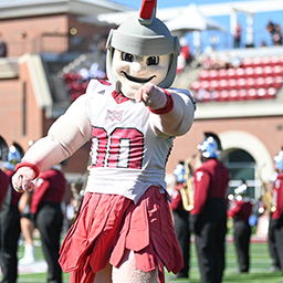 Troy University's mascot, T-Roy, at a football game.