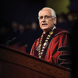 Dr. Hawkins speaking at commencement