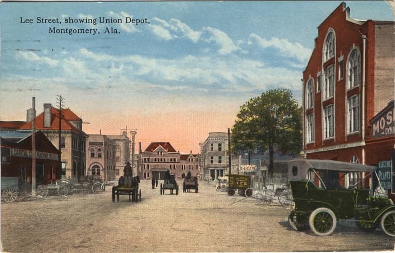 Color print of Lee Street in downtown Montgomery, Alabama showing commercial buildings and the Union Depot at the end of the street. Postmarked November 28, 1917.