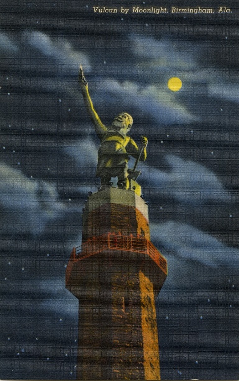 Color print of the Vulcan statue located in Birmingham, Alabama at night.