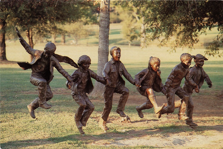 Color photograph of the "puddle jumpers" bronze sculpture located near the Alabama Shakespeare Festival building in the Blount Cultural Park in Montgomery, Alabama.
