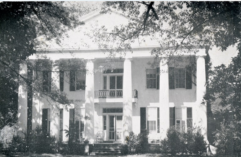 Black and white photograph of two-story Magnolia Grove, the home of Richard Pearson Hobson, in Greensboro, Alabama. Postmarked May 23, 1950.