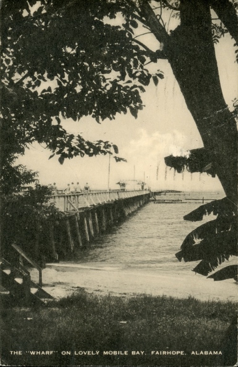 Black and white photograph of the municipal pier on Mobile Bay at Fairhope, Alabama. Postmarked December 8. 1952.