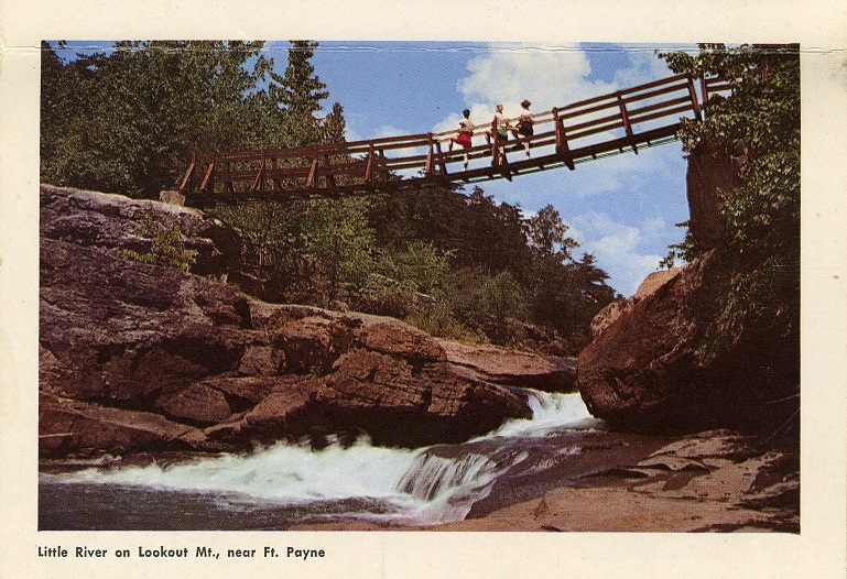Color photograph of a pedestrian bridge and the Little River Canyon near Fort Payne, Alabama. Postmarked September 28, 1958.
