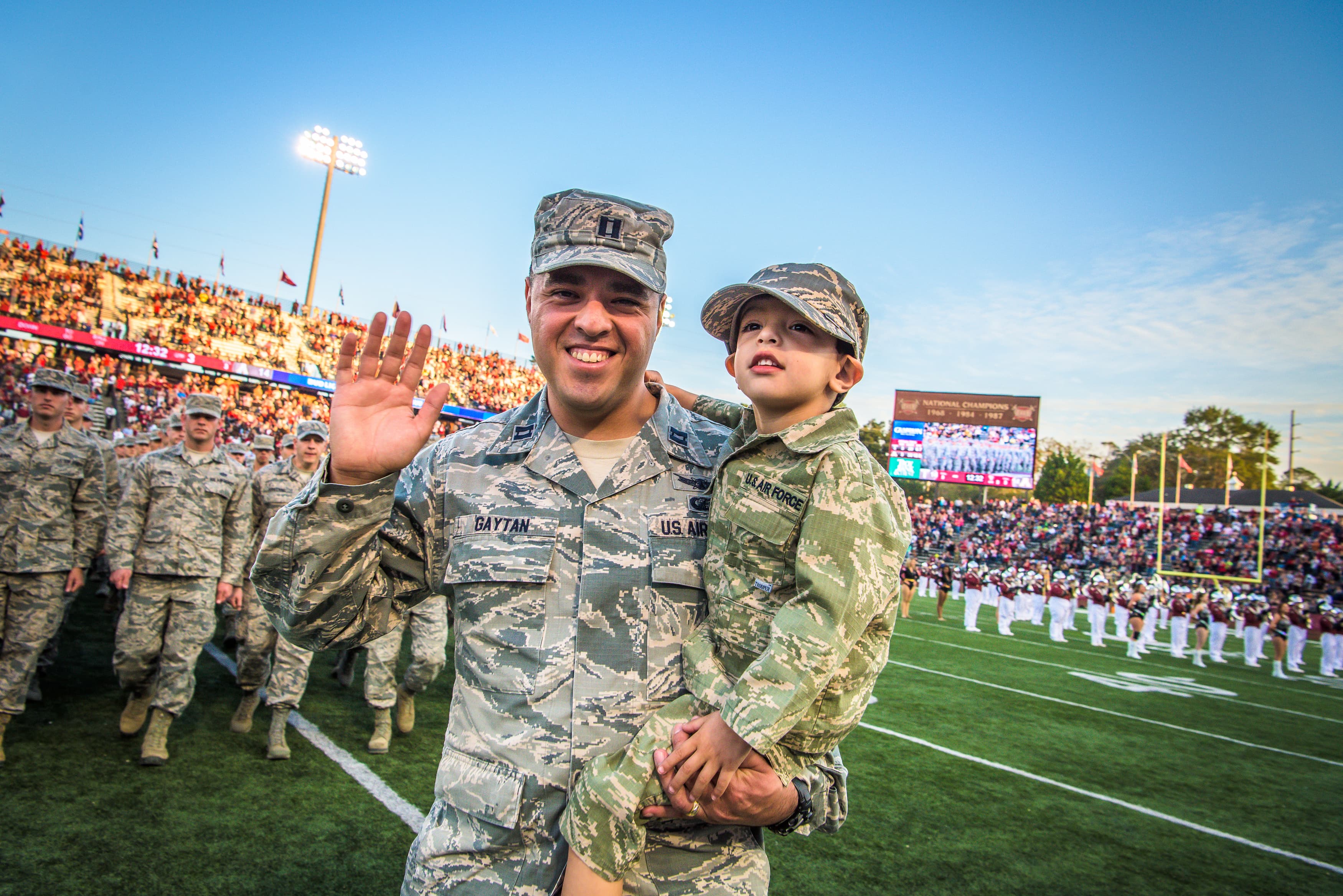 Military Service Member with his child