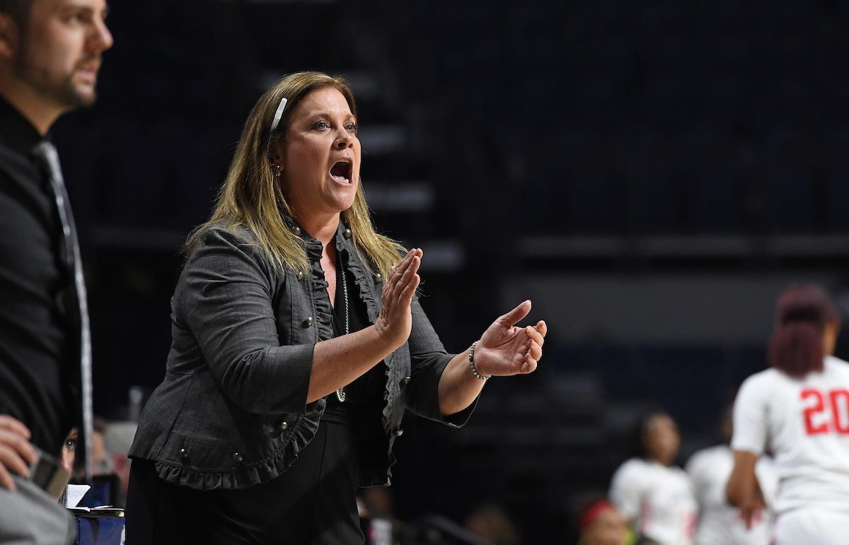 TROY Women's Basketball coach, Chanda Rigby, coaching from the sidelines.