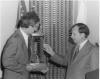 L-R: Bill Floyd, Jimmy Grant receive trophy for AUSA membership Drive, ca.  1962