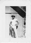 Willie Gene Martin, migrant harvester, standing before shed, poss. In orange harvest in Florida.