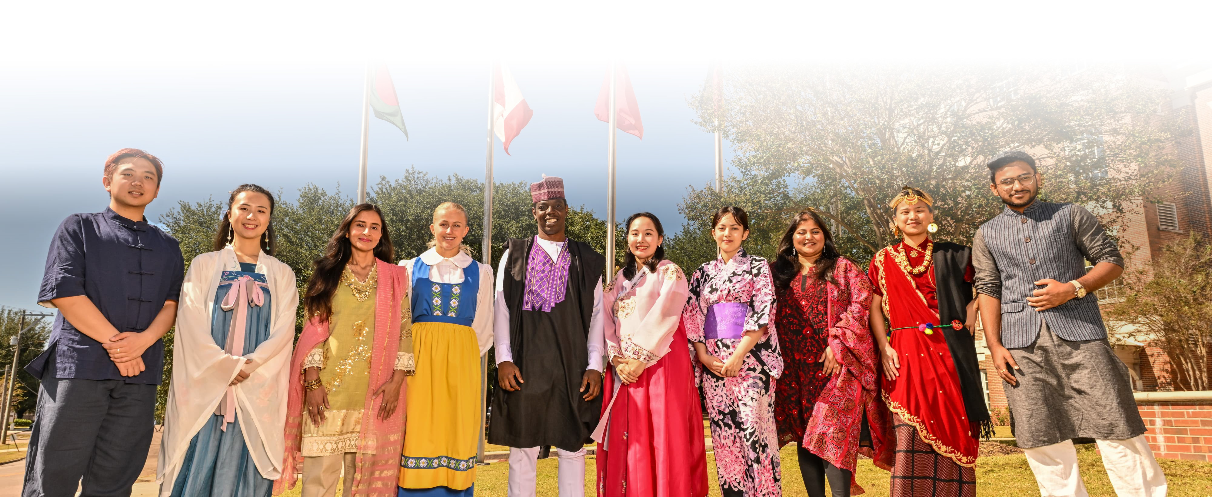 TROY International students in traditional clothing.